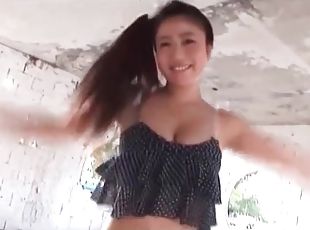 Big boobs Japanese girl in low cut top dances