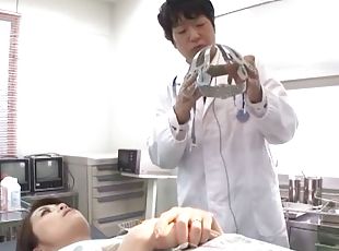 A doctor tests his Asian patient by teasing her tits and toying her pussy