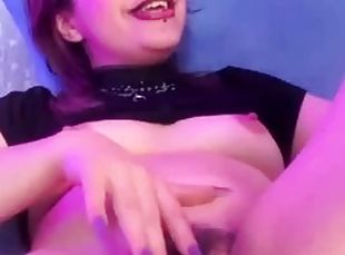 Sucks a dildo while she rubs her meaty pussy