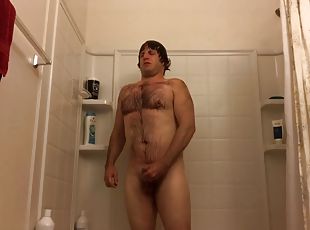 Hairy stud masturbates in the shower voyeur