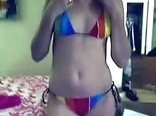 Webcam teen stripping off her tiny and sexy bikini