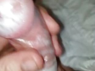 stroking my cock with lube and condom