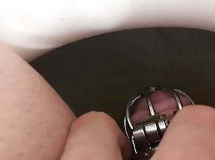 Guy in Chastity Pees in the Toilet