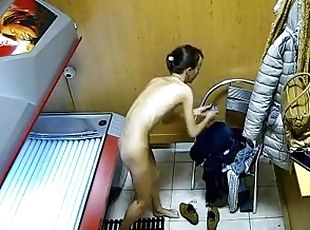 European teen undressed in solarium