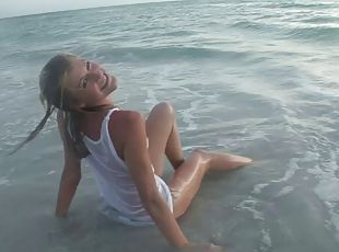 Amateur blonde teen naively poses in Wet T-shirt on the beach