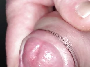 Close up edging tight foreskin with big cockhead