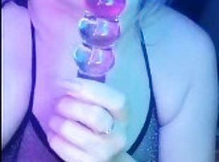 Sensual blowjob on a glass dildo