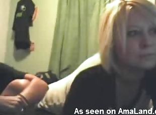 Blonde emo girl bares her huge tits on the camera