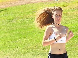 Sporty blonde babe Dakota exposes her pussy in public while jogging