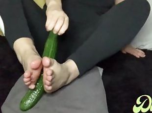 Footjob with cucumber