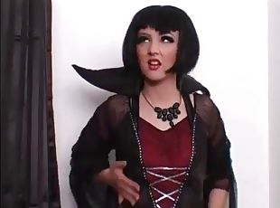 Katie K puts on a black wig for some dark lesbian fun