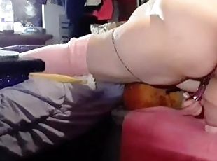Kneeling on chair showing my ass and using glass dildo in pussy