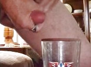 Cumming in glass of water